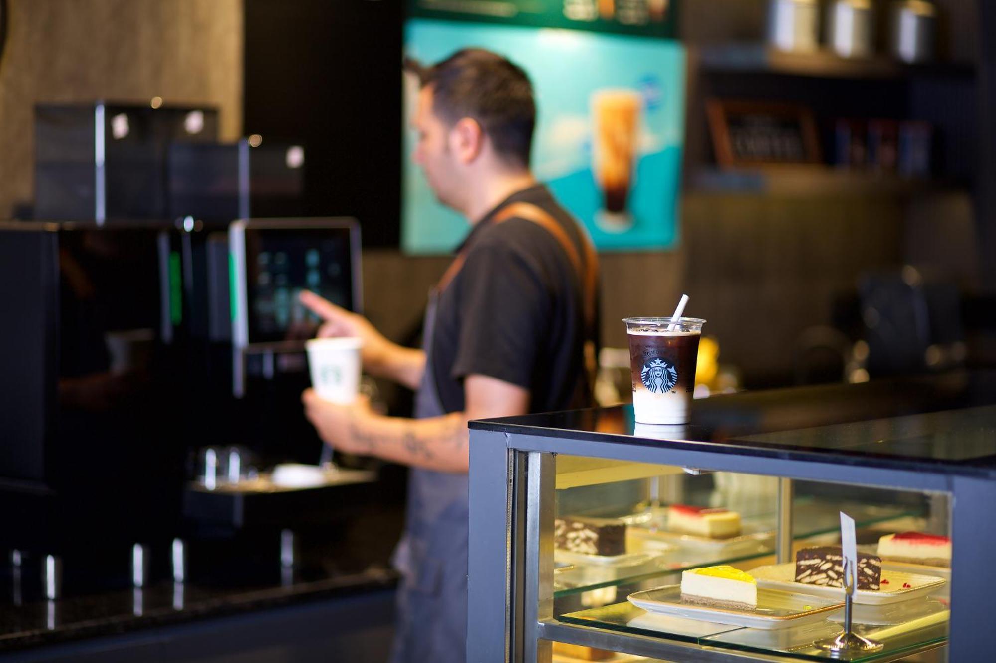 Ramada By Wyndham Istanbul Merter Esterno foto A barista at work